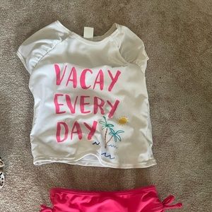 swimsuits size 4T. 3 suits $25/ $10 a piece two old navy/ruffle is  boutique